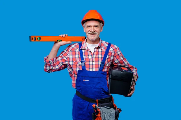 Foto Van Professionele Arbeider Bouwer Blauw Uniform Met Wandmaat Gereedschapskist — Stockfoto