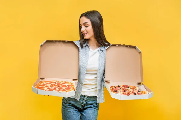 Girl Yellow Background Holds Two Pizzas Copy Space — Stock Photo, Image