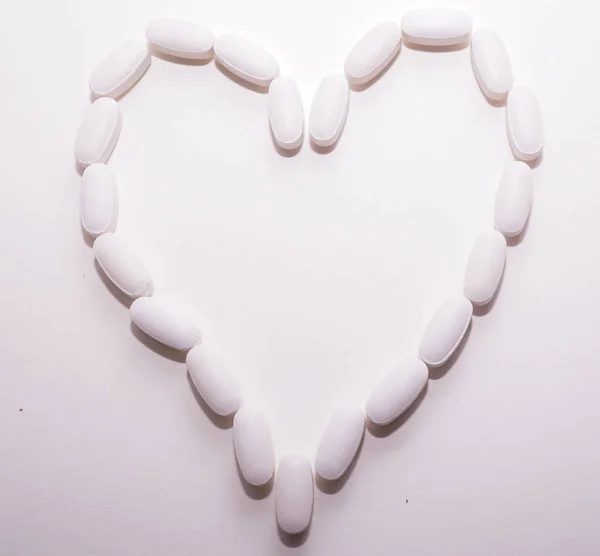 White Oval Heart Shaped Pills Closse Each Other Background Pharmacy — Stock Photo, Image