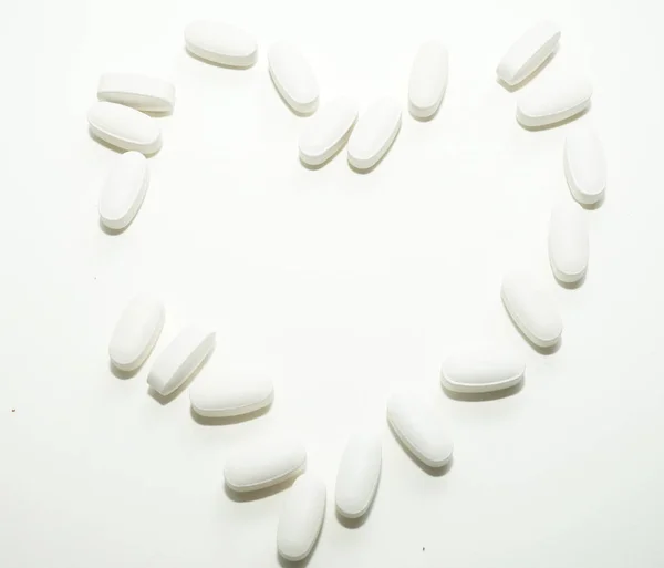 White Oval Heart Shaped Pills Closse Each Other Background Pharmacy — Stock Photo, Image