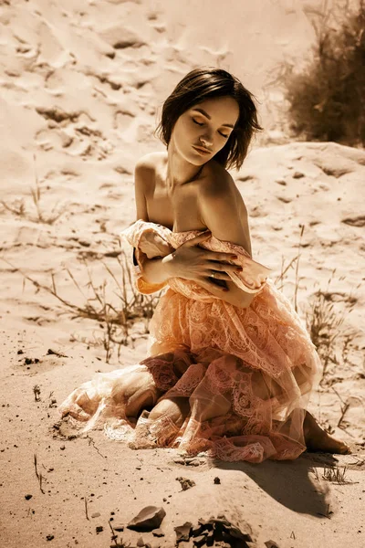 Beauty Girl Pink Dress Sits Sand Closed Eyes Desert — Stock Photo, Image