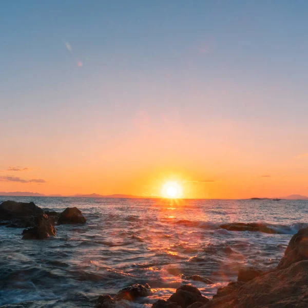Warm summer sunset at the sea — Stock Photo, Image