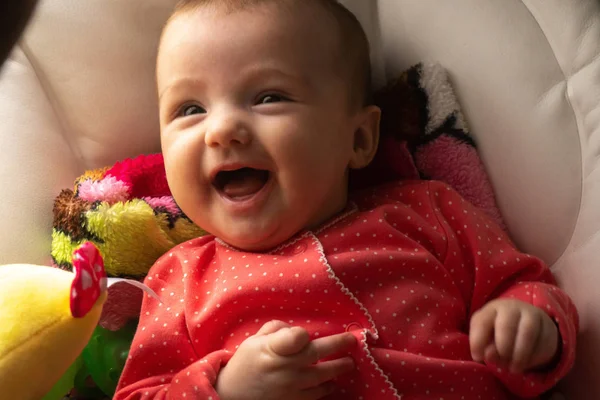 Happy little baby girl smiles — Stock Photo, Image