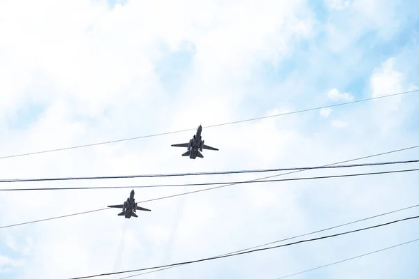 Khabarovsk, Russia - May 9, 2019: Victory Day celebration. Victory in the World War II. Military aircraft and helicopters fly over the city during the parade. — Stock Photo, Image