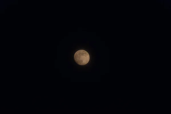 Full moon isolated on a black sky — Stock Photo, Image