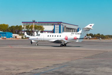KHABAROVSK, RUSSIA - SEP 29, 2018: Hawker Siddeley HS-125-700A RA-02809 Weltall-Avia stands in Khabarovsk airport.