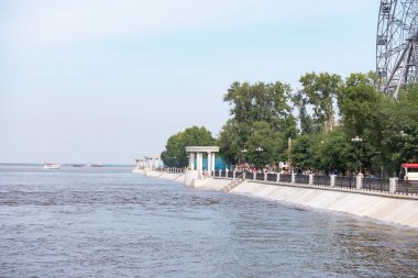 Khabarovsk, Russia - Aug 08, 2019: Flood on the Amur river near the city of Khabarovsk. The level of the Amur river at around 159 centimeters. clipart