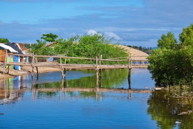 Panay, Philippines - Jan 23, 2020: The slums are made of bamboo. Impoverished areas of the Philippines. clipart