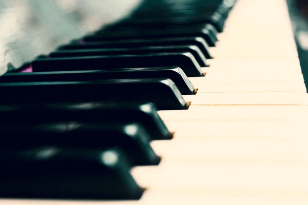 Piano keys in light blue sepia — Stock Photo, Image