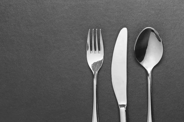 Knife Fork Spoon Black Table Top View — Stock Photo, Image