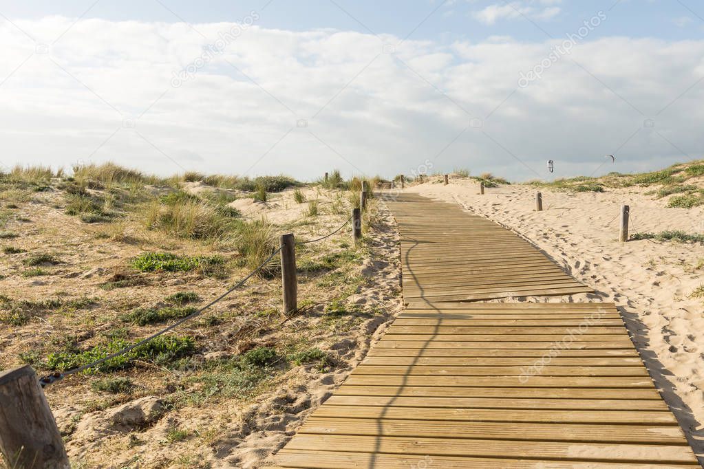 a wooden beach way on island saint clement des baleines france on a sunny spring day