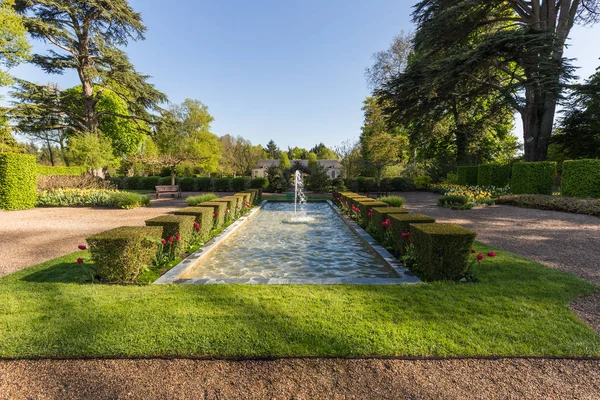 Shot on a sunny day of the Fountain and Garden of Castle Cheverny Loire Valley