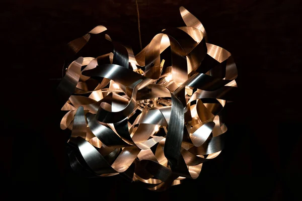 Metal Ribbon Chandelier Closeup Modern Lampshade Copper Silver Textured Background — Stock Fotó