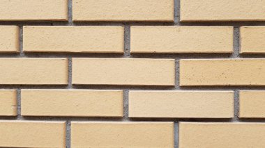 Desenli kalıp, tuğla duvar arkaplanı.