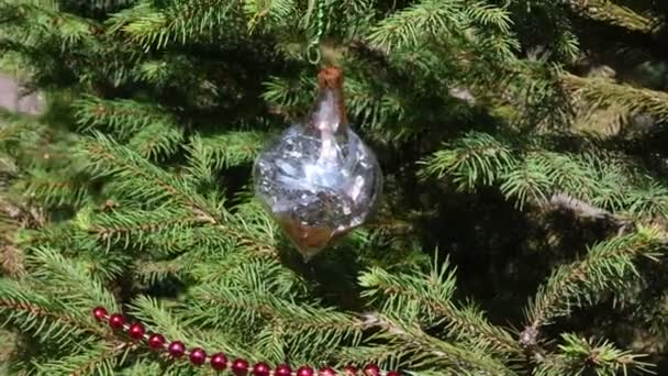 Vintage Glass Ball Shiny Silver Tinsel Christmas Tree Evergreen Branches — Stock Video