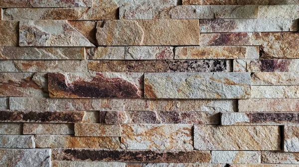 コピースペースとラフ石レンガ造りの壁の背景 天然建築材料の中性色質感 建築の詳細 — ストック写真