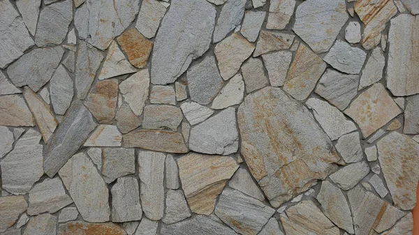 Ściana Cegły Pokryta Szorstkimi Kawałkami Kamienia Stary Kamienny Mur Budynku — Zdjęcie stockowe