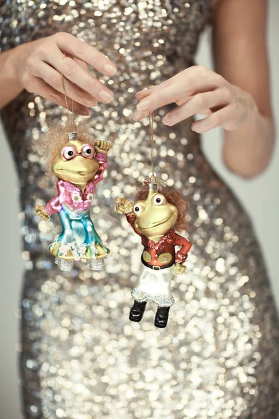 Woman Hands Close Holding Christmas Decoration Baubles Little Dancing Frogs — Stock Photo, Image