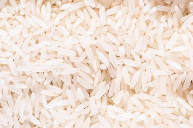 Yukarıdan görülen pirinç taneleri. Basmati pirincinin arka planı (Üst Manzara)