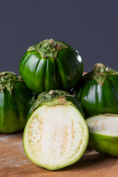 Scarlet eggplant. Some cut in half.