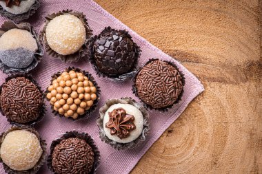 Brigadeiro. Typical Brazilian sweet. Many types of brigadiers together.Top View clipart