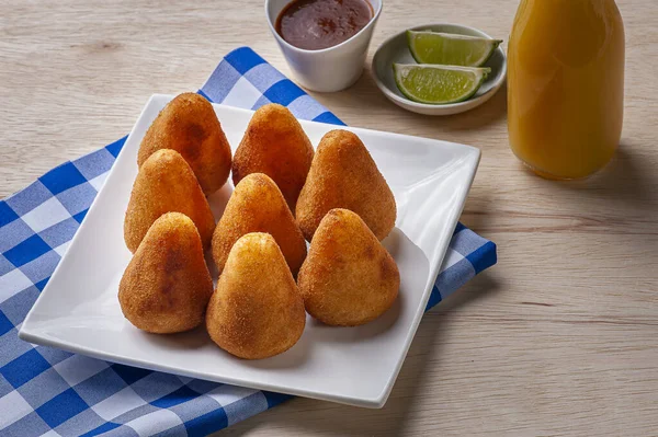 Portion of coxinha. Appetizer of Brazilian cuisine served in bars and parties.