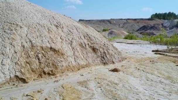 Old clay quarry smoothed stony slope and flat bottom — Stock Video