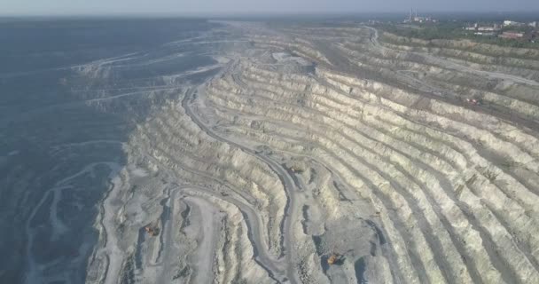 Aerial asbestos terraces with machinery and shady canyon — Stock Video