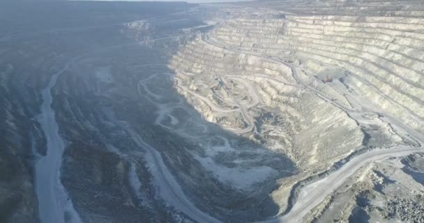 Aerial panorama deep asbestos cascade pit with excavator — Stock Video