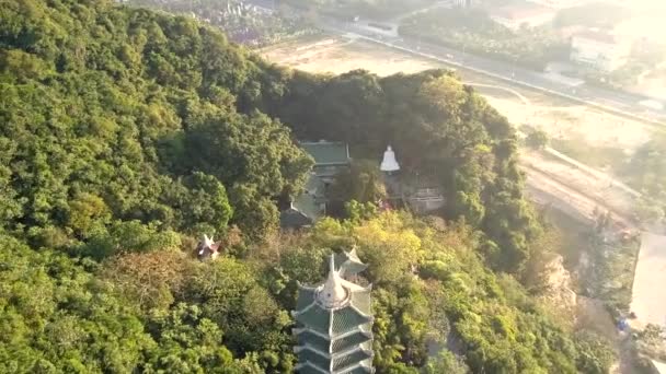 Upper view buddhist temple with pagodas in bright sunlight — Stock Video