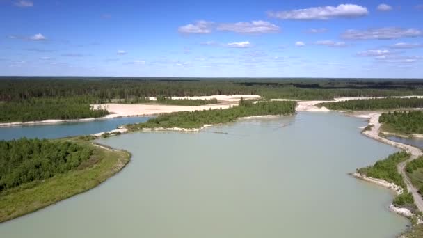 Lake with islands and abandoned mining sites bird eye view — Stock Video