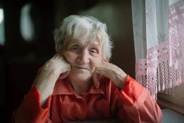 Elderly Woman Sits Window House — Stock Photo, Image