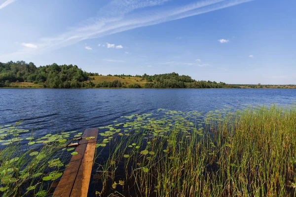 Rive Lac Avec Des Planches Bois Dans Village — Photo