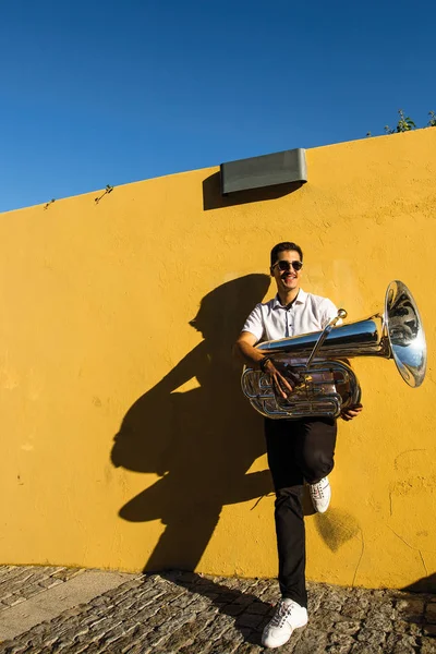 Young Musician Tuba Stands Street Yellow Wall — Stock Photo, Image