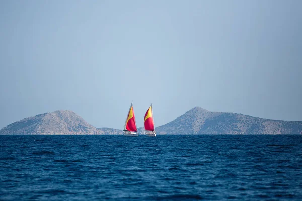 Sailing luxury boats participate in sail yacht regatta, Aegean Sea - Greece.