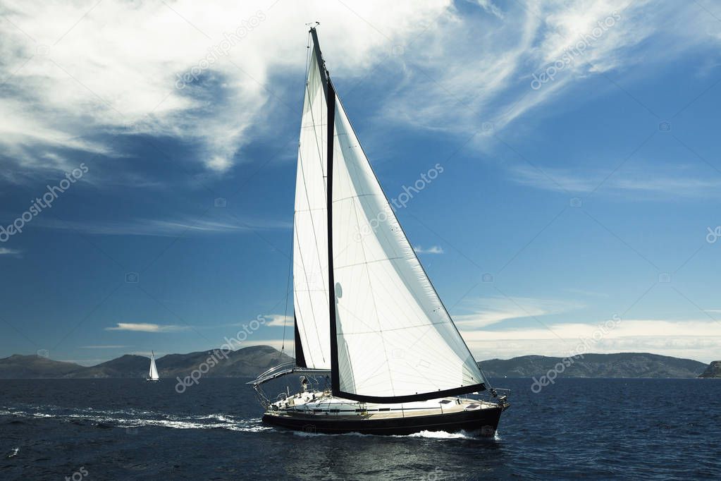 Sailing yacht boat in the Sea. Luxury Yachts for vacation. 