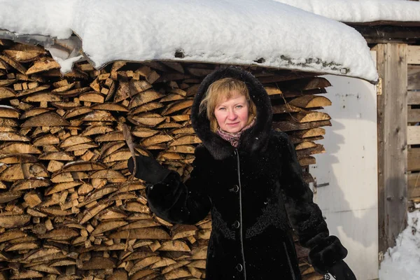 Woman Sheepskin Coat Winter Stands Wood Shed Village — Stock Photo, Image