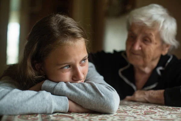 Old Granny Comforting Crying Little Girl Granddaughter — Stock Photo, Image