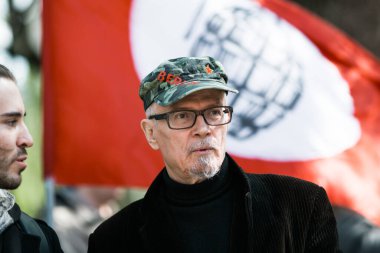 MOSCOW - MAY 1, 2016: Eduard Limonov (1943-2020), russian nationalist writer and political dissident, founder and former leader of the banned National Bolshevik Party, in rally marking the May Day.  clipart