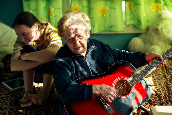 Elderly Old Woman Plays Guitar Her Granddaughter — Stock Photo, Image