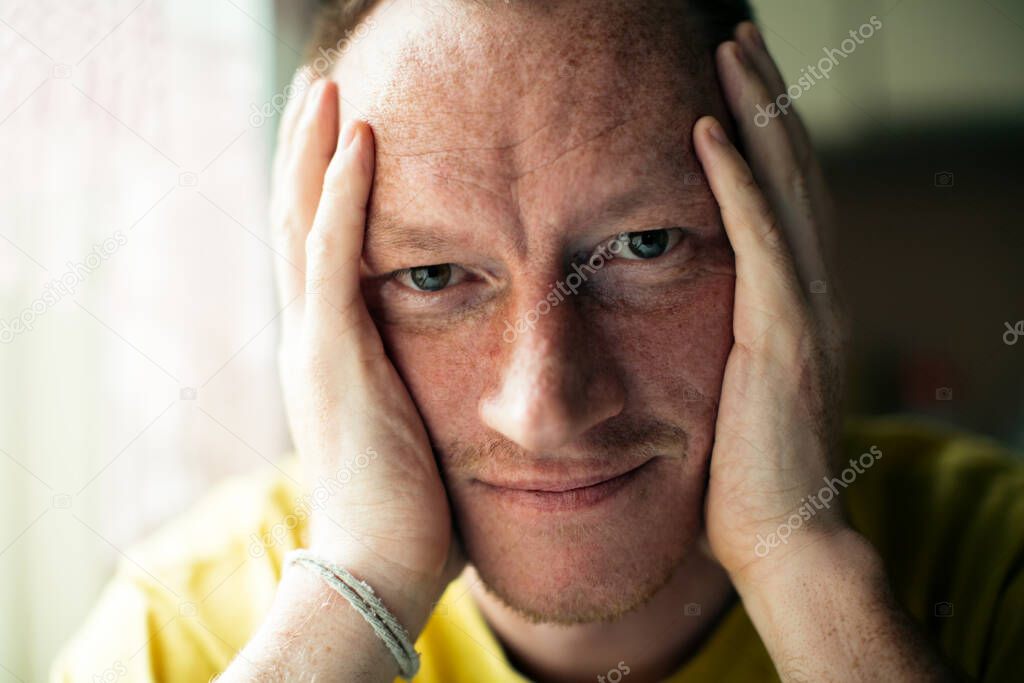 Close-up portrait of a middle-aged man.