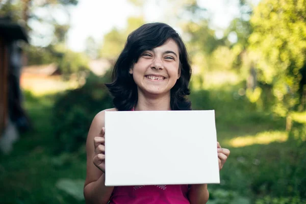Teen Girl Holding Clean White Sheet Paper Banner Your Message — Stock Photo, Image
