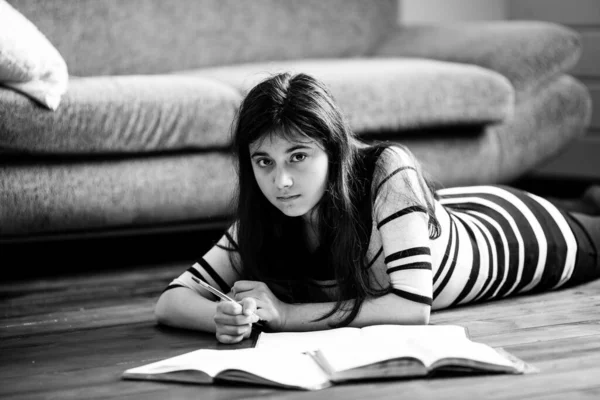 Schoolgirl Doing Homework Lying Floor Room Black White Photography — Stock Photo, Image