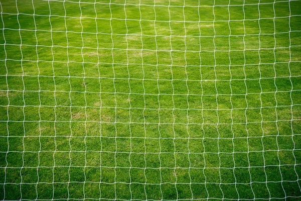 緑の草サッカー フィールド背景にネット サッカー — ストック写真