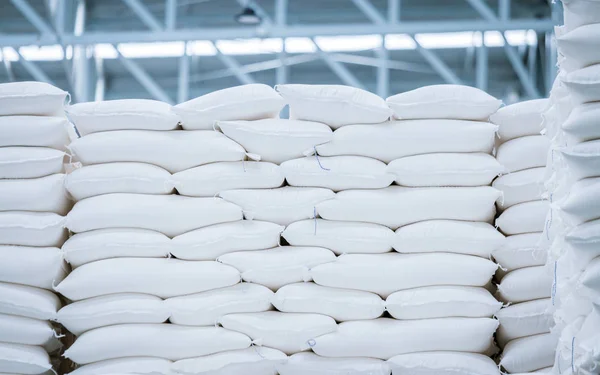 Pile de sac blanc dans l'entrepôt — Photo