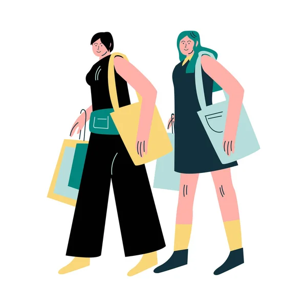 Jóvenes sonrientes amigas caminando con bolsas con compras después de comprar — Vector de stock