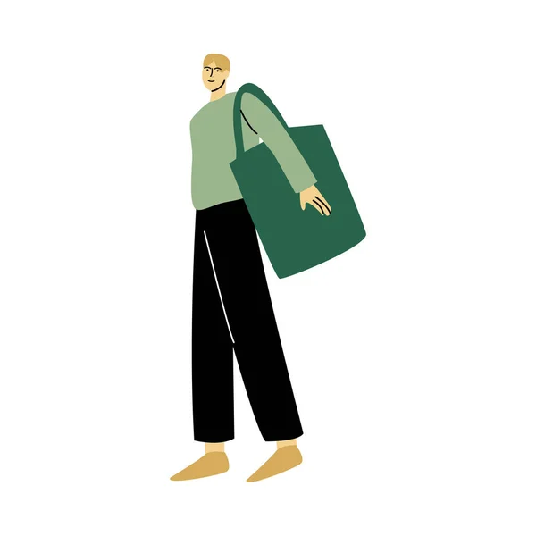 Щасливий усміхнений чоловік у зеленій футболці, що стоїть з еко сумкою. Векторні ілюстрації в мультяшному стилі . — стоковий вектор