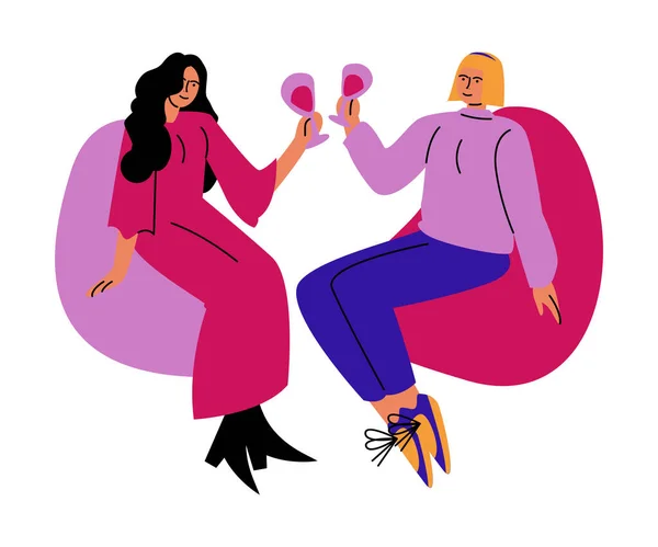 A happy lesbian couple of women drinks wine from glasses sitting on chairs. Vector illustration in cartoon style. — Stock Vector