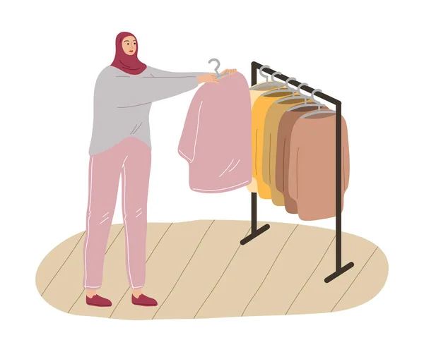 Молодая мусульманка в хиджабе и повседневной одежде делает покупки — стоковый вектор