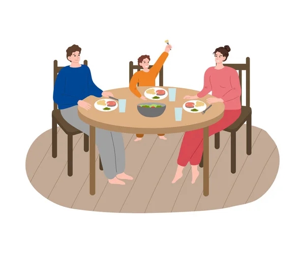 Familia joven con hijo disfrutando de la cena con salmón y ensalada juntos — Archivo Imágenes Vectoriales